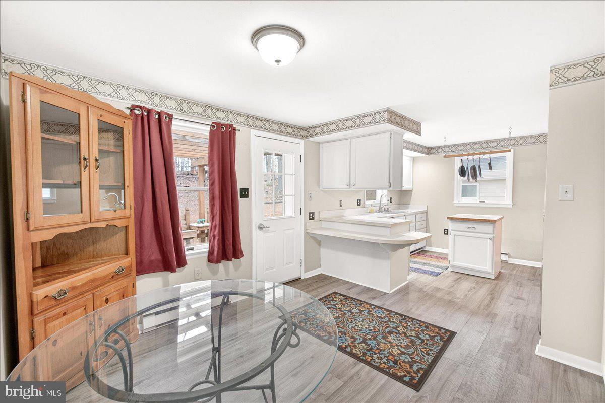 9505 Cabbage Run Road Frederick, MD 21701 - Photo 13 of 50 a bathroom with a sink mirror and a bathtub