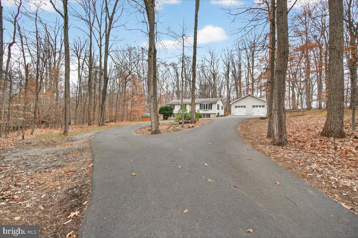 9505 Cabbage Run Road Frederick, MD 21701 - Photo 2 of 50 a view of a road with a building