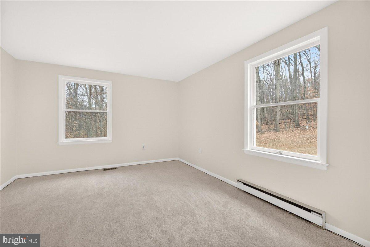 9505 Cabbage Run Road Frederick, MD 21701 - Photo 21 of 50 an empty room with a window