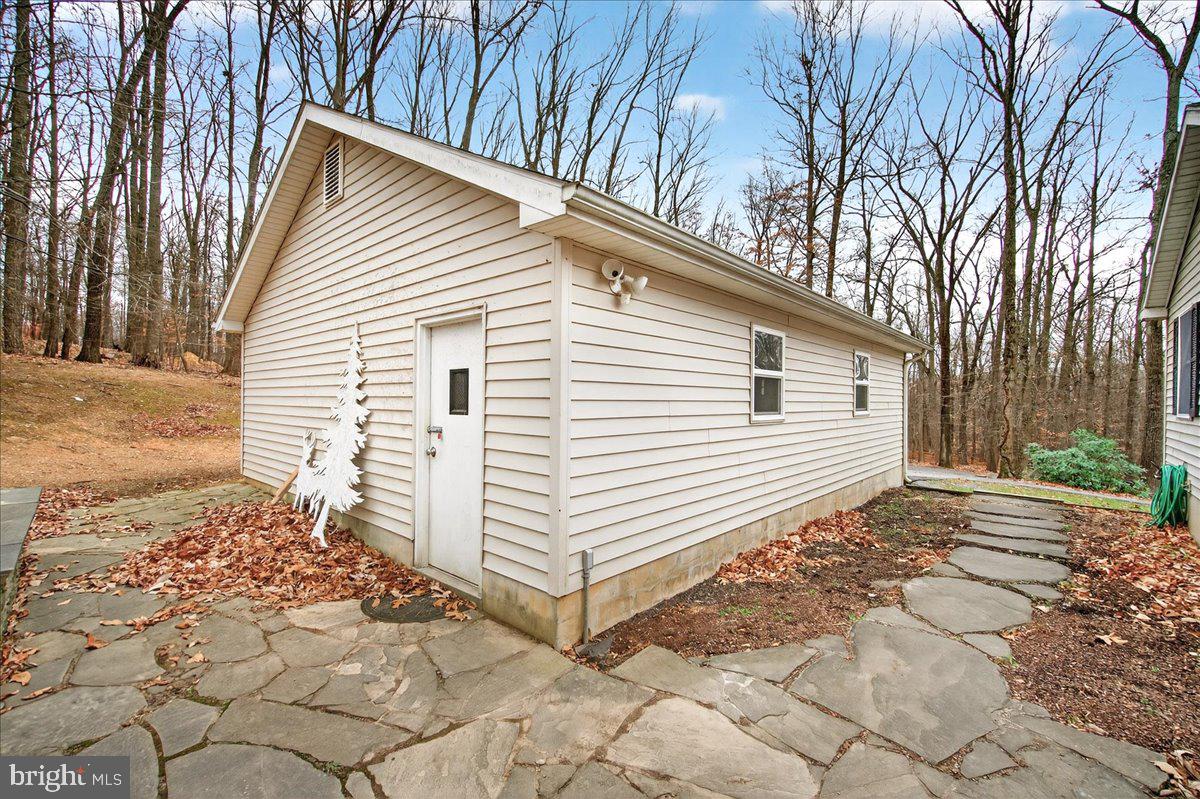9505 Cabbage Run Road Frederick, MD 21701 - Photo 39 of 50 a view of a house with a yard