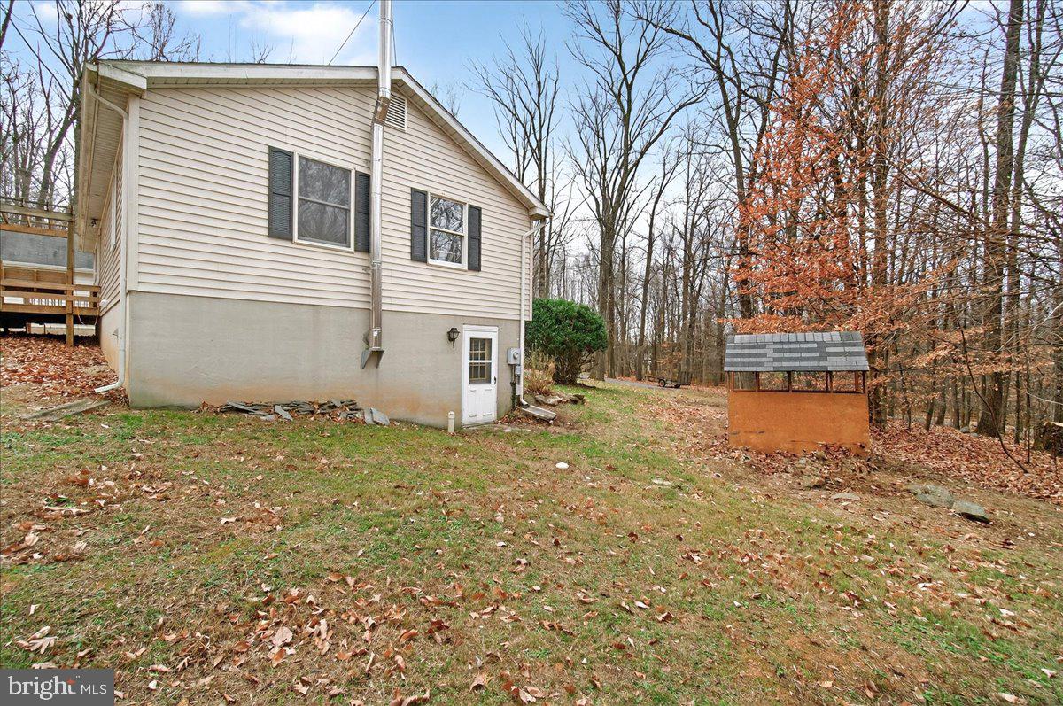 9505 Cabbage Run Road Frederick, MD 21701 - Photo 43 of 50 a view of a white house with a yard
