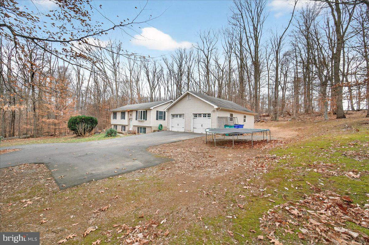 9505 Cabbage Run Road Frederick, MD 21701 - Photo 46 of 50 a view of house with outdoor space and street view