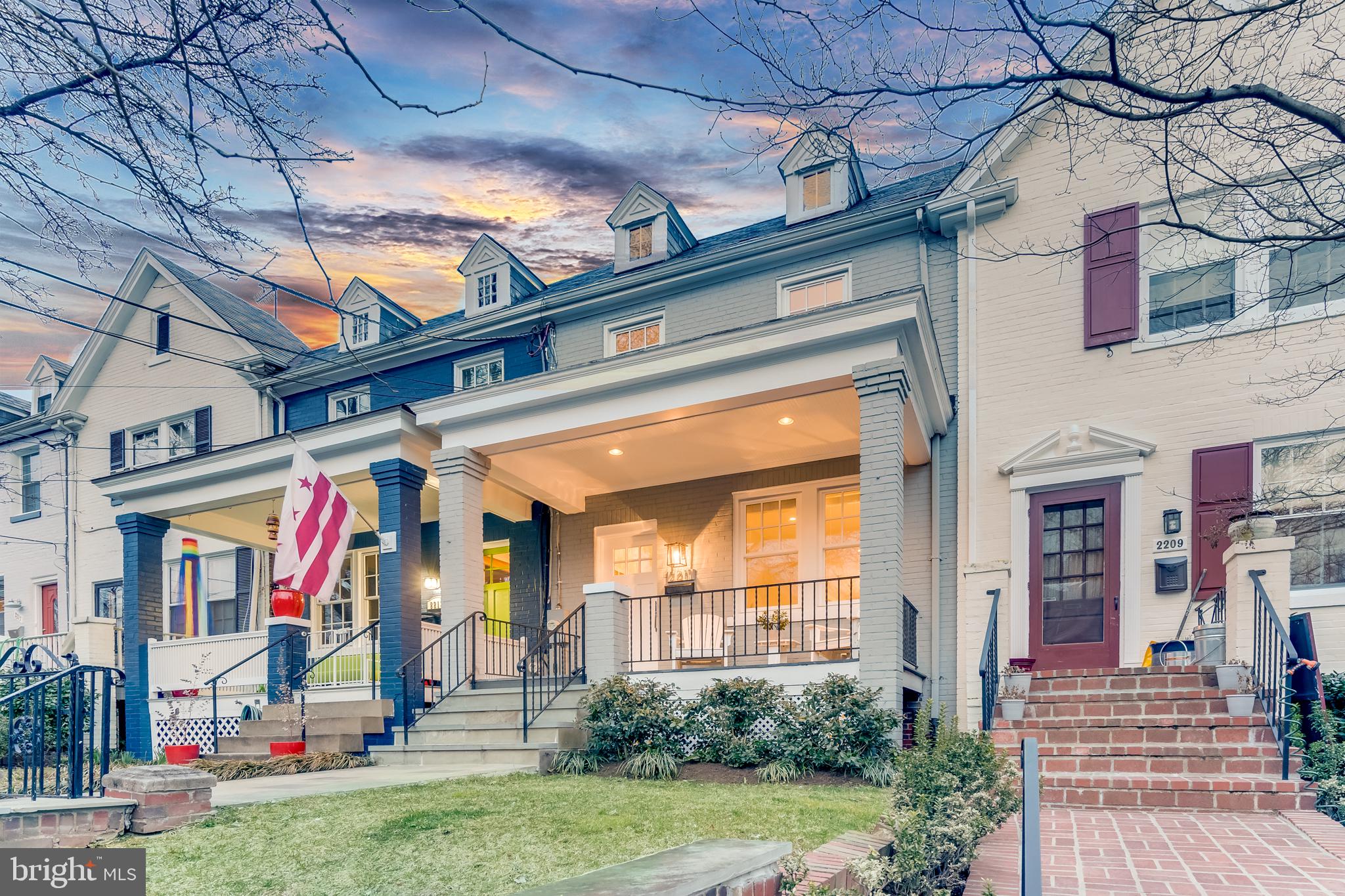 2211 38th Street Northwest Washington, DC 20007 - Photo 1 of 51 a view of a building with a yard
