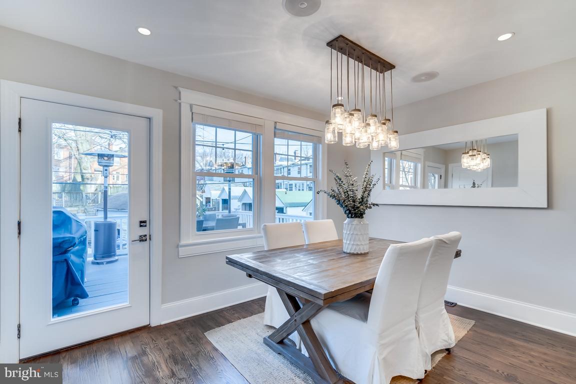 2211 38th Street Northwest Washington, DC 20007 - Photo 15 of 51 a view of a dining room with furniture window and wooden floor