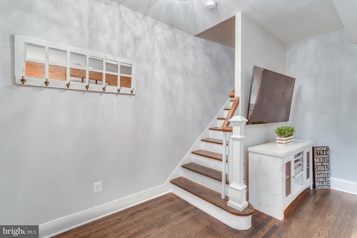 2211 38th Street Northwest Washington, DC 20007 - Photo 18 of 51 a view of entryway with wooden floor