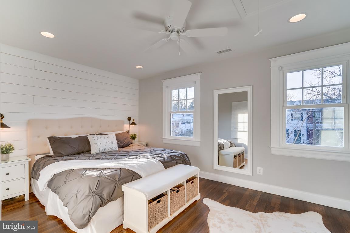 2211 38th Street Northwest Washington, DC 20007 - Photo 19 of 51 a bedroom with a large bed and a window