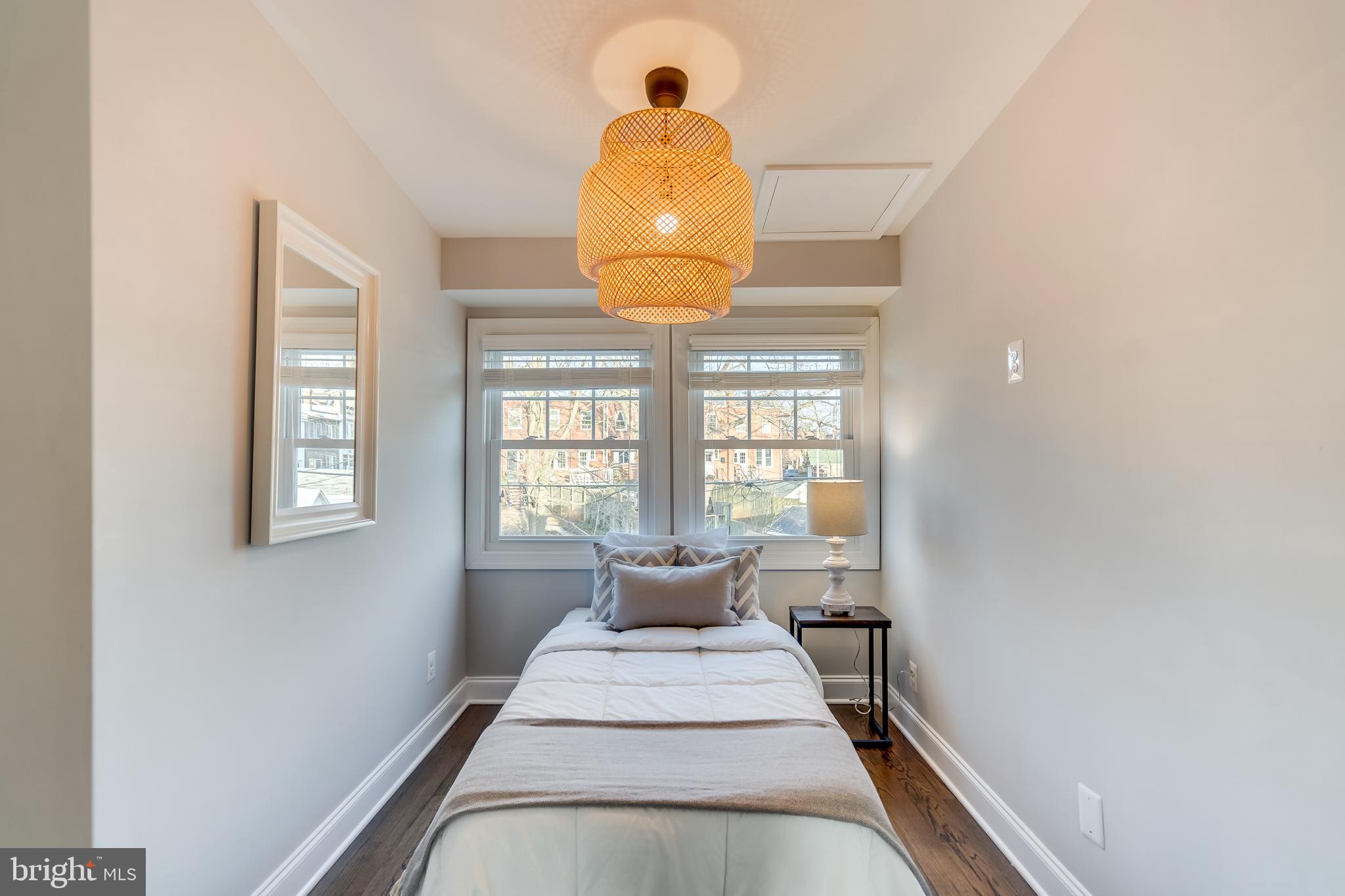 2211 38th Street Northwest Washington, DC 20007 - Photo 25 of 51 a bedroom with a bed and window