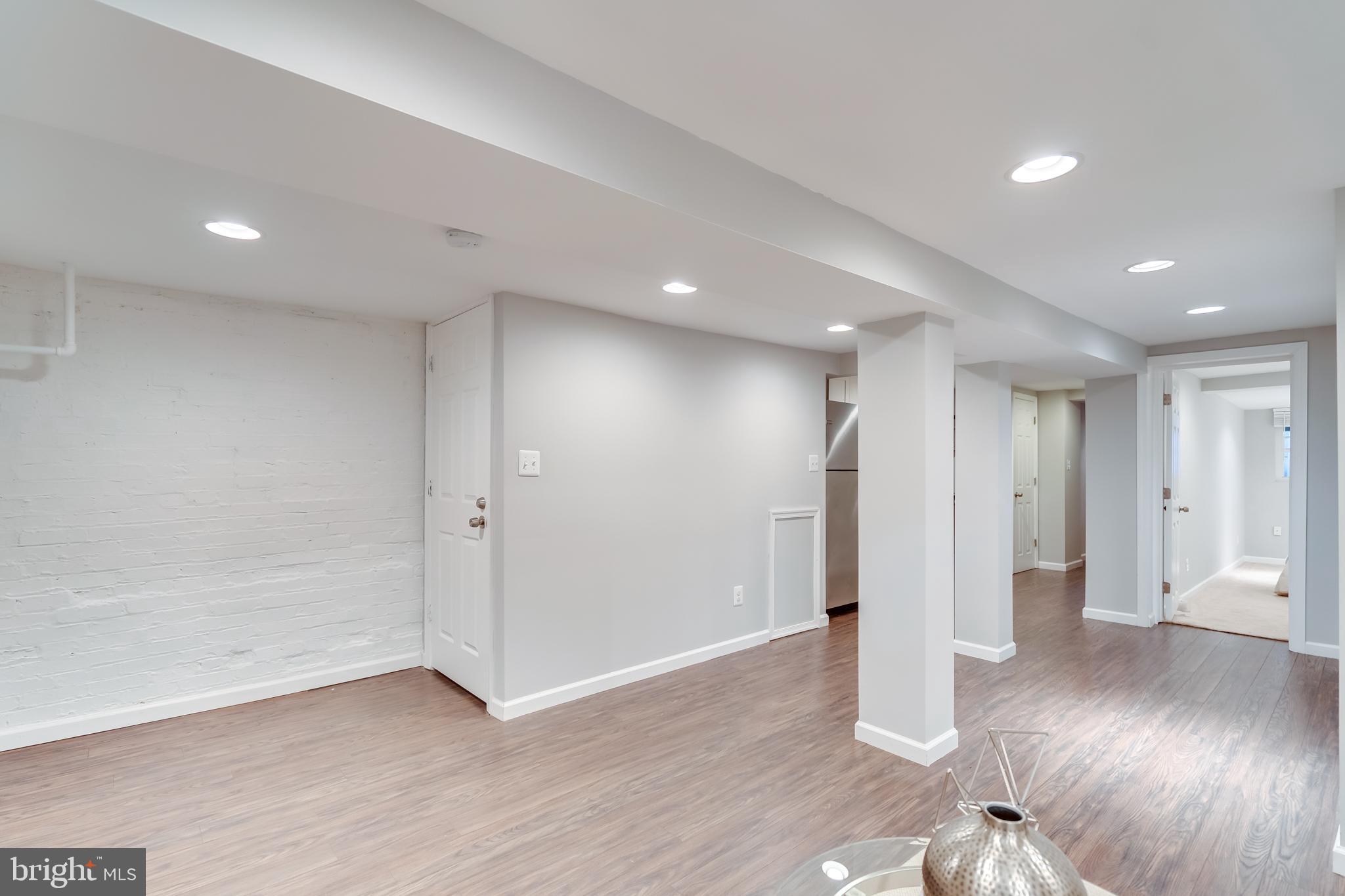 2211 38th Street Northwest Washington, DC 20007 - Photo 33 of 51 a view of empty room with wooden floor