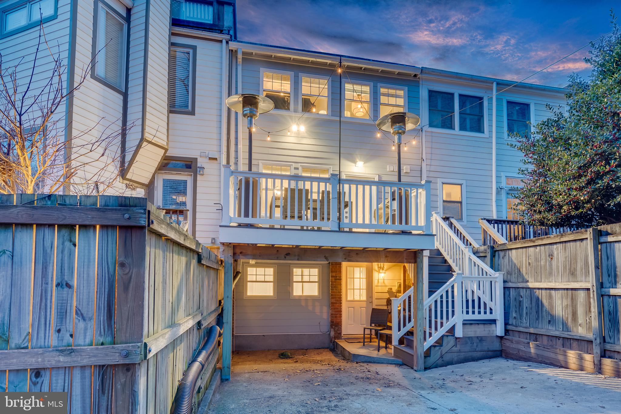 2211 38th Street Northwest Washington, DC 20007 - Photo 39 of 51 a front view of a house with a yard