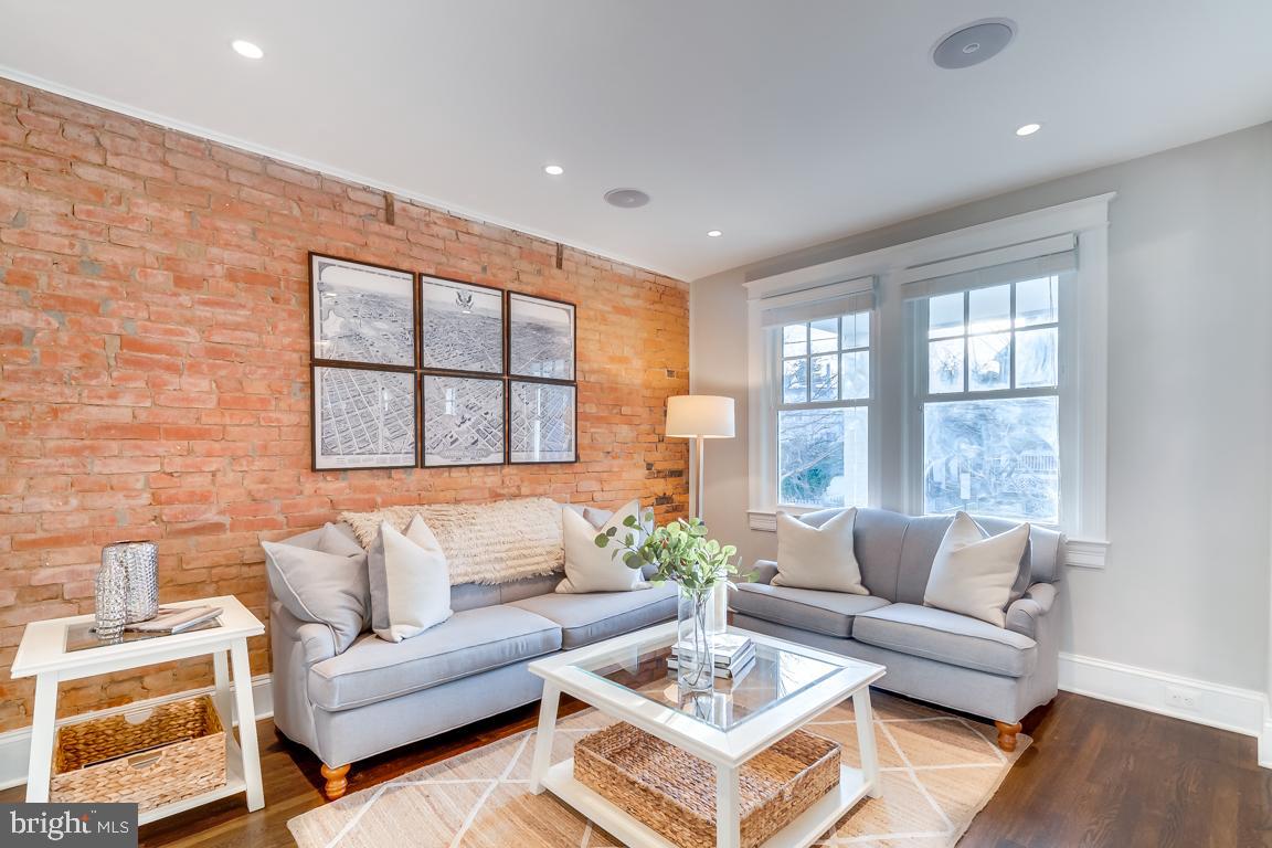 2211 38th Street Northwest Washington, DC 20007 - Photo 5 of 51 a living room with furniture and a large window