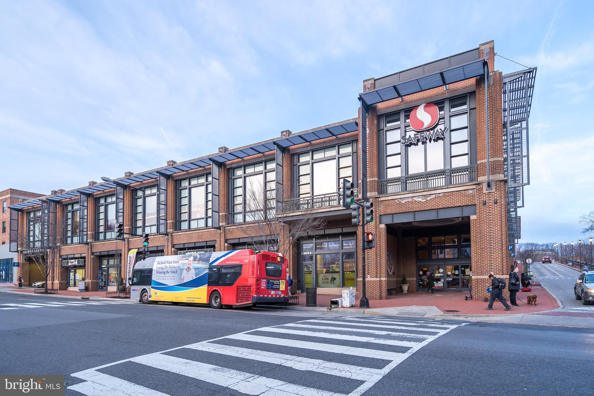 2211 38th Street Northwest Washington, DC 20007 - Photo 42 of 51 a front view of building with cars parked