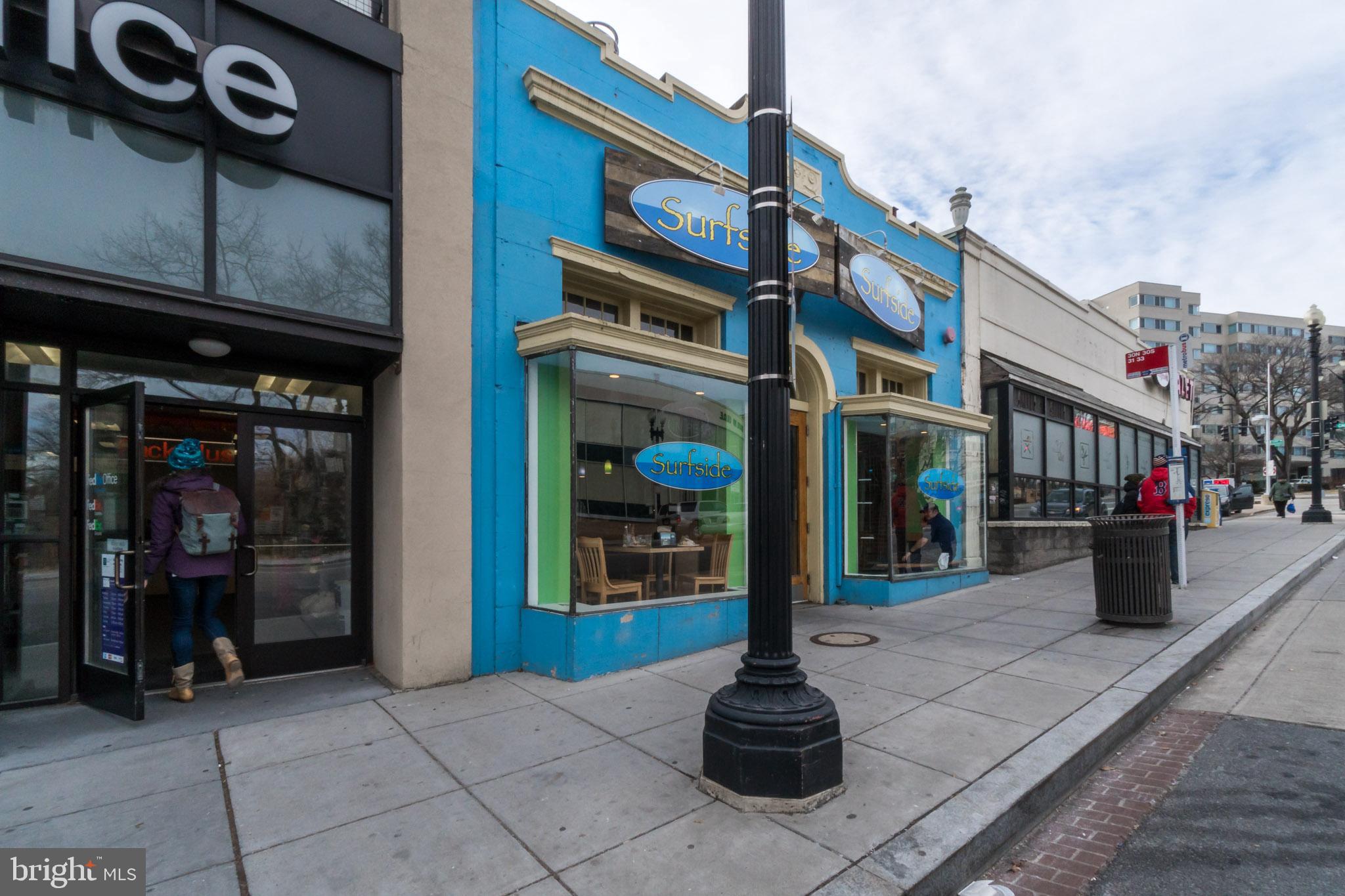 2211 38th Street Northwest Washington, DC 20007 - Photo 47 of 51 a view of a street with shops