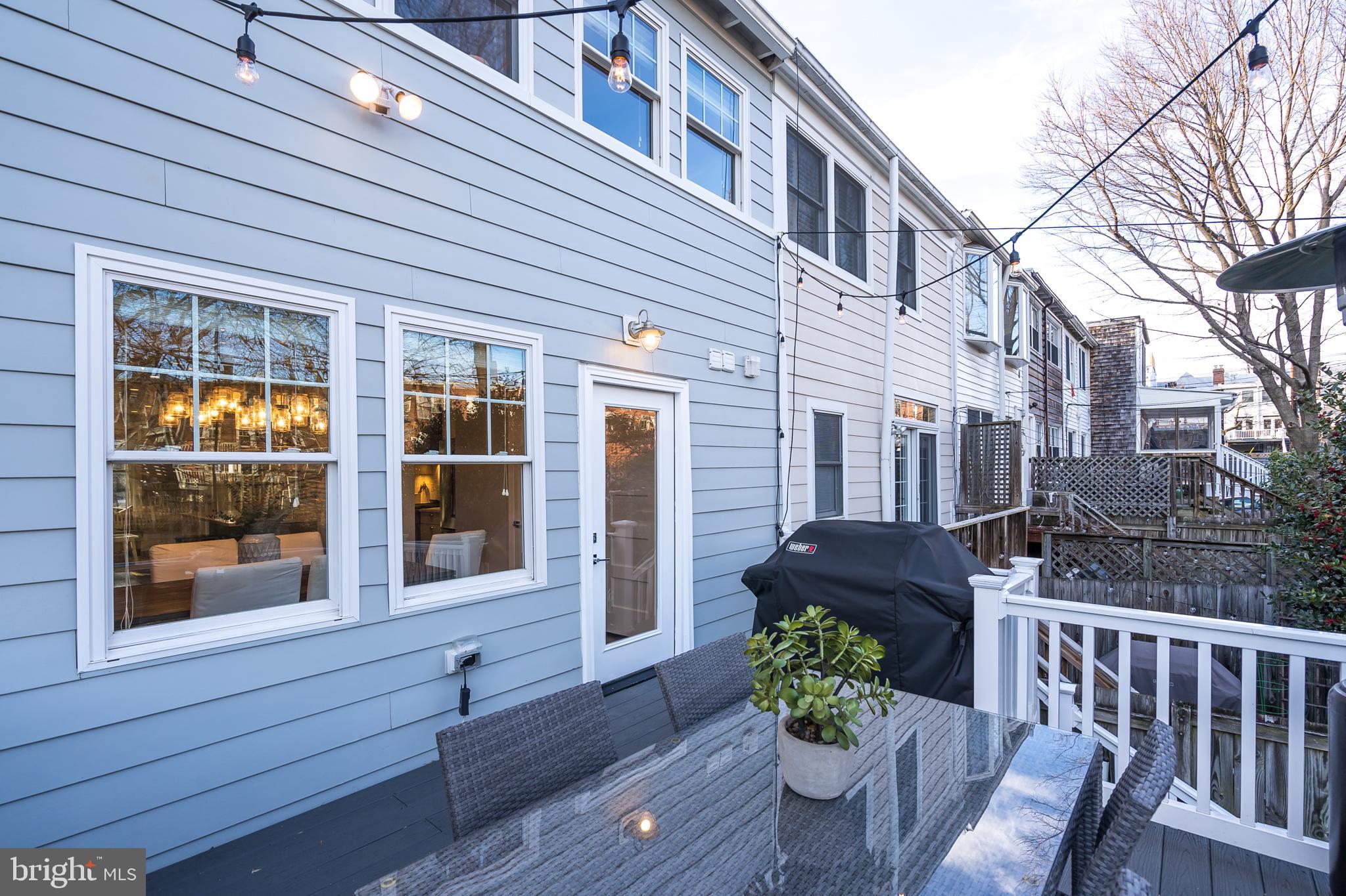 2211 38th Street Northwest Washington, DC 20007 - Photo 50 of 51 a front view of a house with a garden