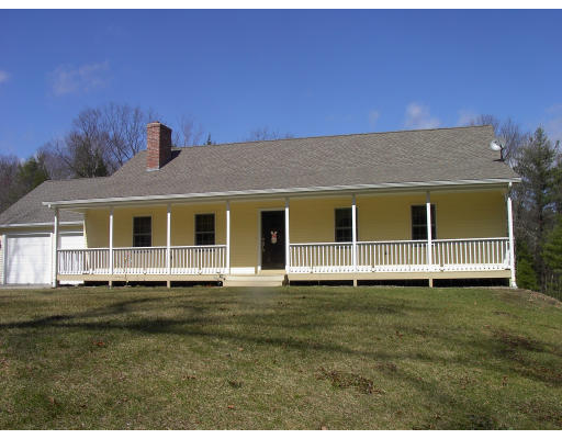 33 Coffey Hill Road Ware, MA 01082 - Photo 1 of 1 a front view of a house with a garden