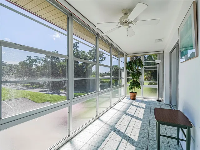 a view of a porch with a backyard