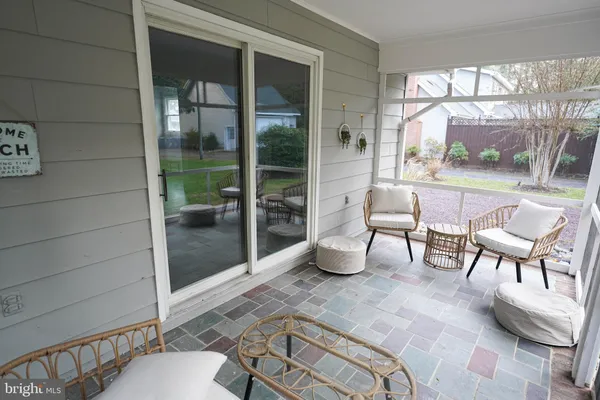 a workspace with furniture and a window