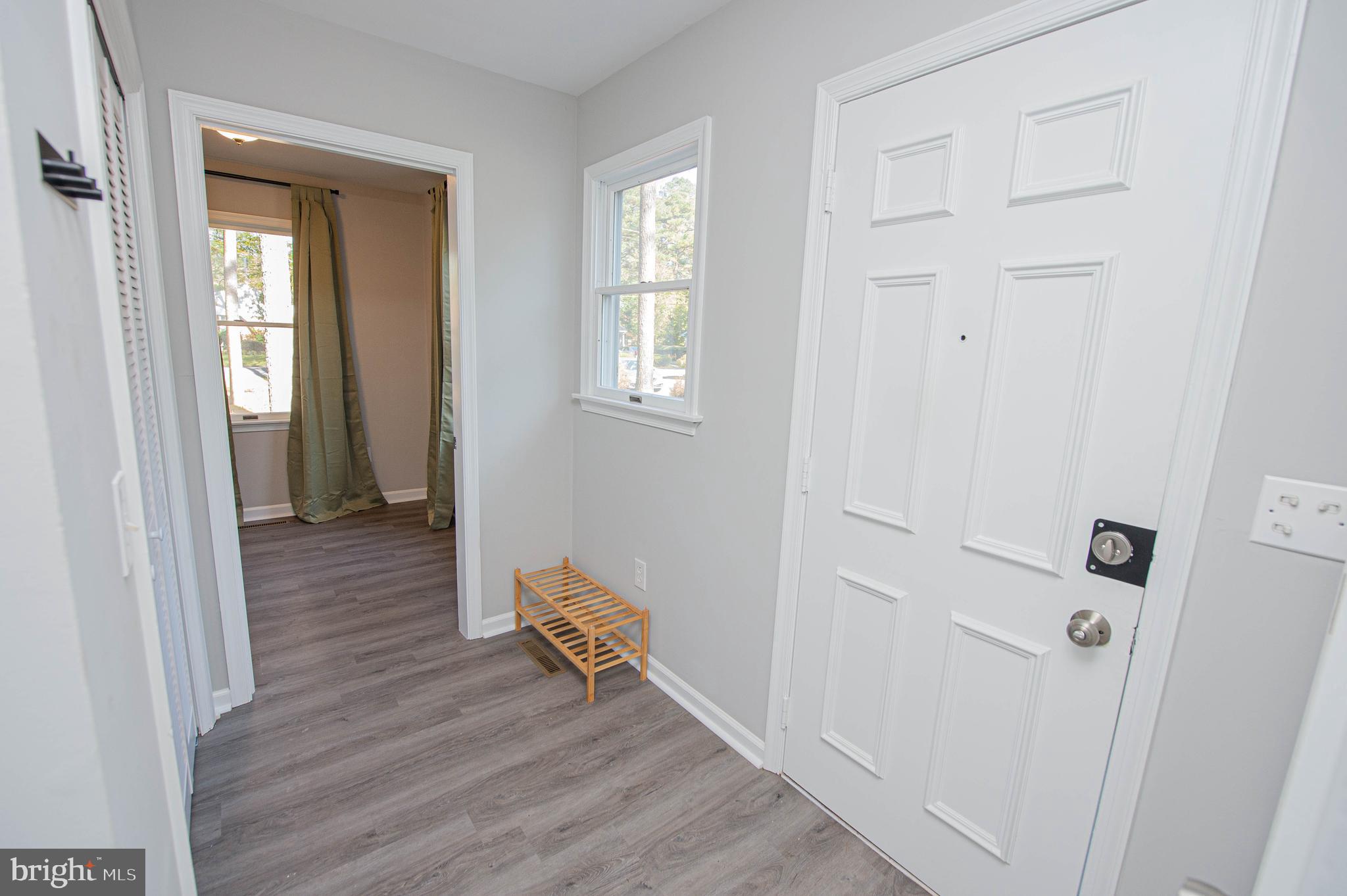 414 Pine Bluff Road Salisbury, MD 21801 - Photo 18 of 91 a view of room with window and wooden floor