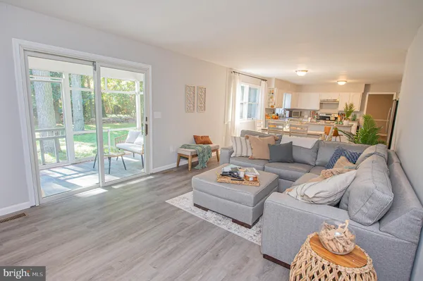 a view of a hallway with a wooden floor