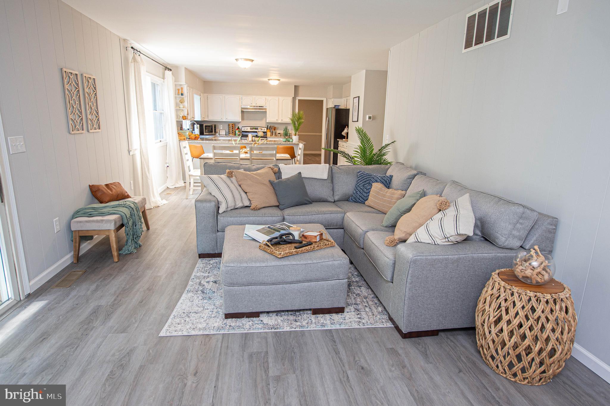 414 Pine Bluff Road Salisbury, MD 21801 - Photo 24 of 91 a living room with furniture and a wooden floor