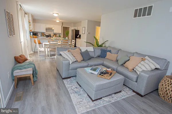 a bathroom with a double vanity sink and mirror