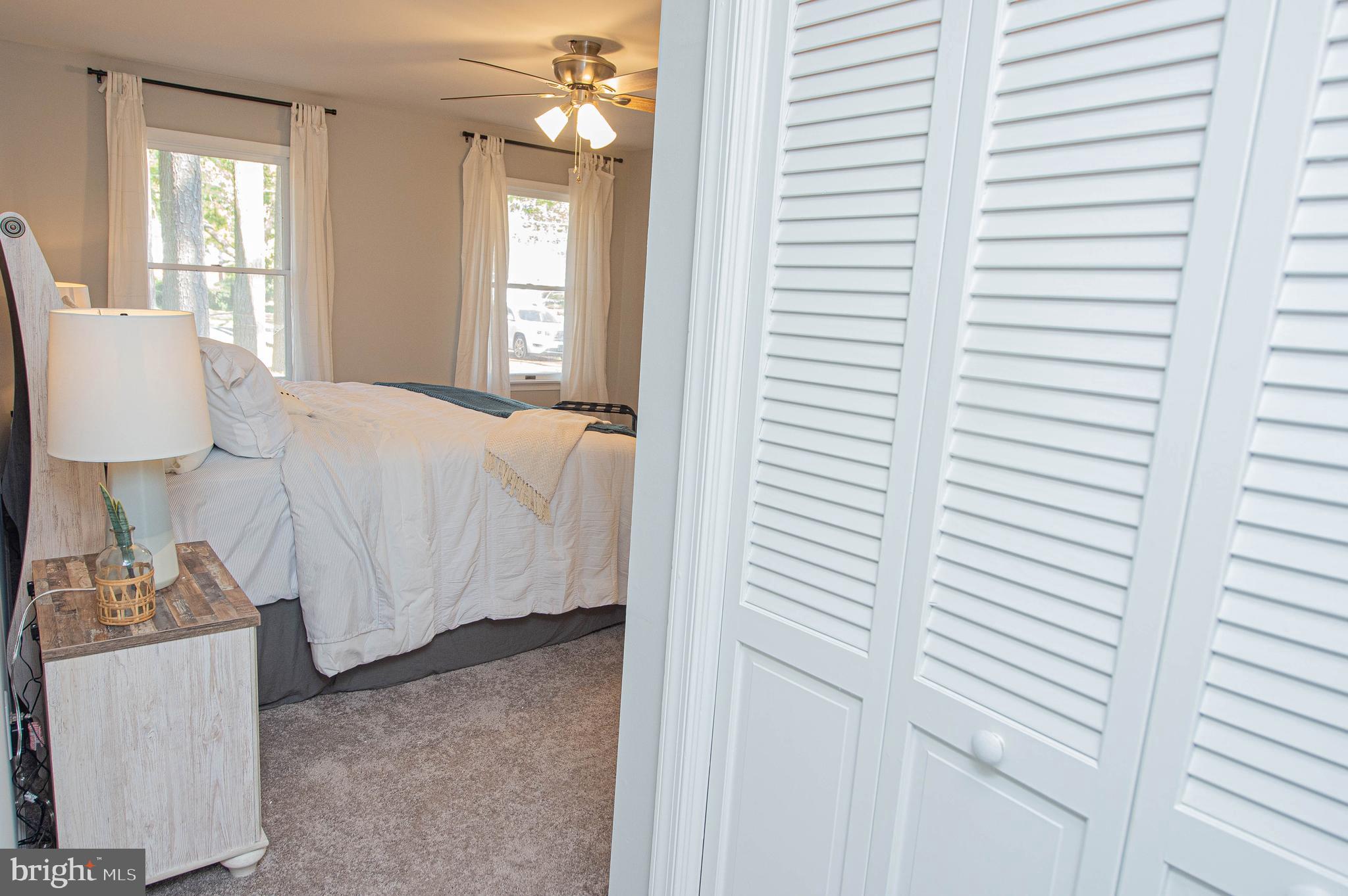 414 Pine Bluff Road Salisbury, MD 21801 - Photo 40 of 91 a bedroom with a bed and a dresser in it