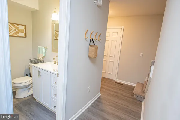 a bathroom with a toilet and a shower curtain