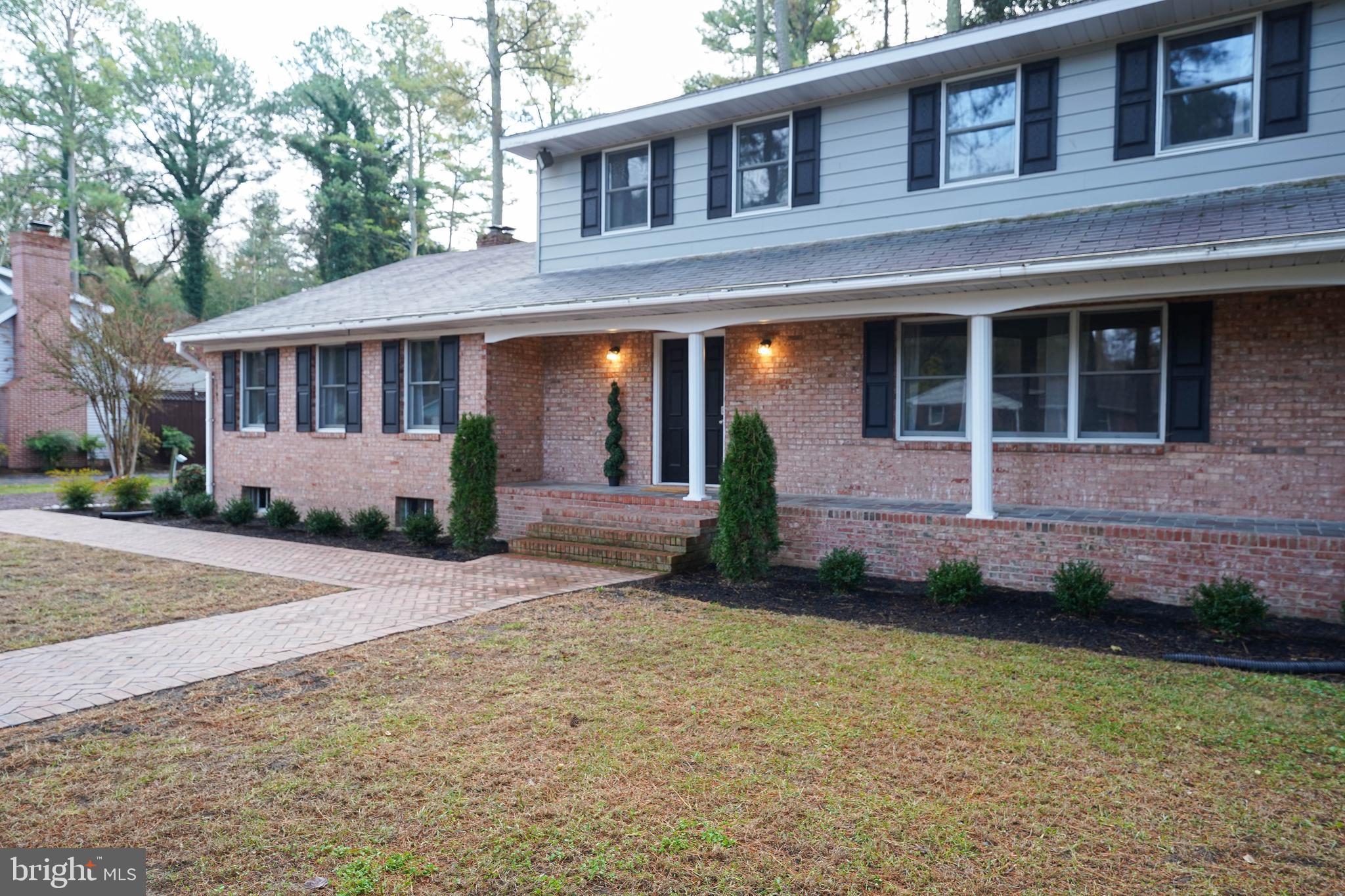 414 Pine Bluff Road Salisbury, MD 21801 - Photo 5 of 91 front view of a house with a yard
