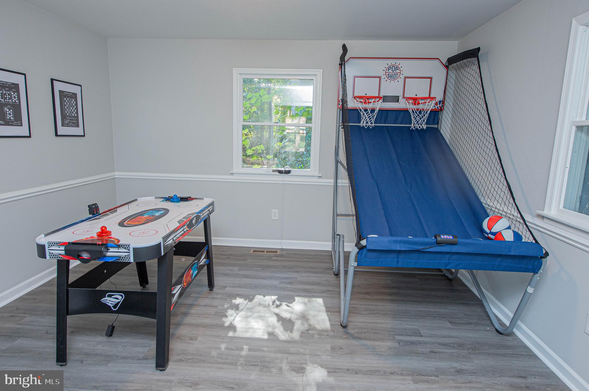 414 Pine Bluff Road Salisbury, MD 21801 - Photo 58 of 91 a room with wooden floor and furniture