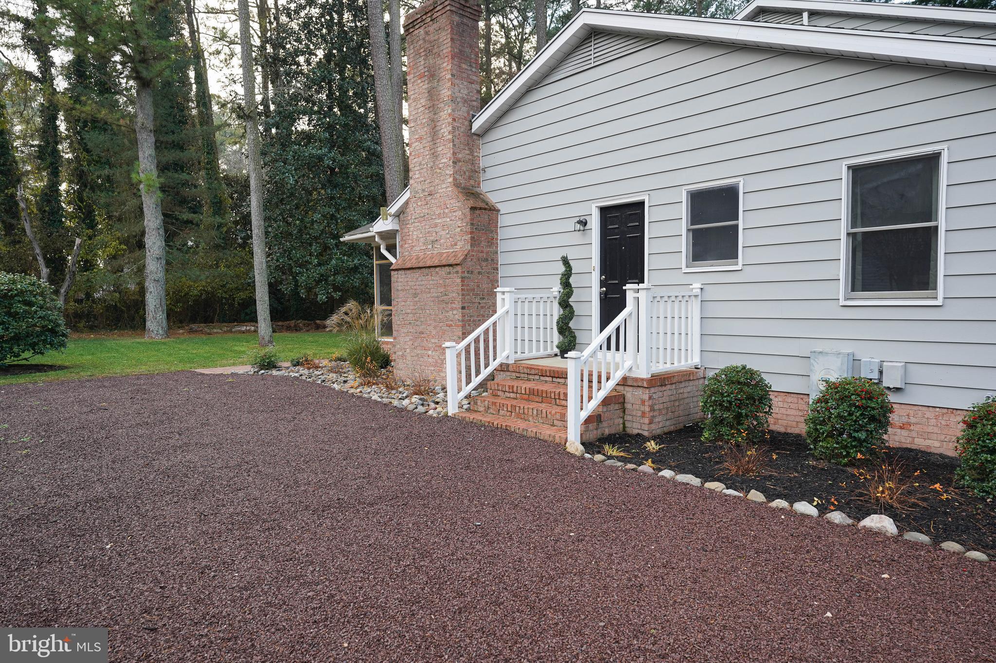 414 Pine Bluff Road Salisbury, MD 21801 - Photo 6 of 91 a view of a house with backyard and trees