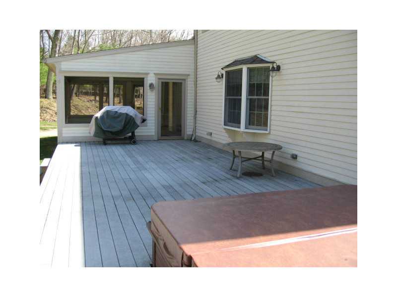 1495 Chopmist Hill Road Scituate, RI 02857 - Photo 14 of 25 Patio/Deck. Large trex deck for entertaining!