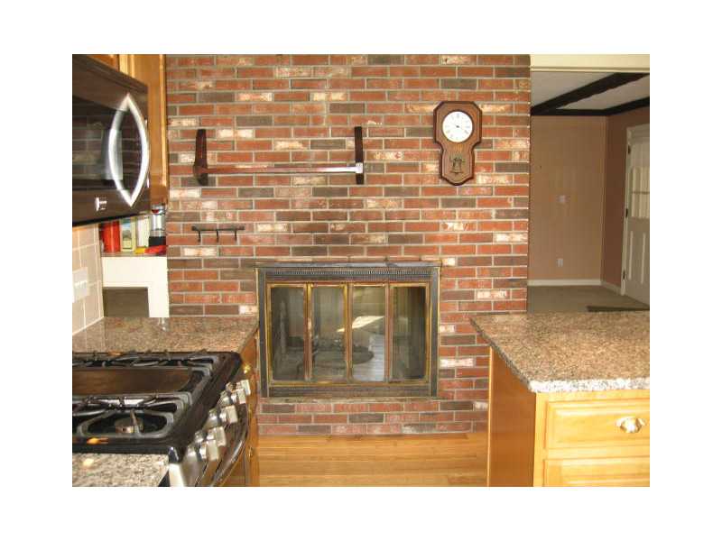 1495 Chopmist Hill Road Scituate, RI 02857 - Photo 4 of 25 Kitchen. Double fireplace in kitchen area!