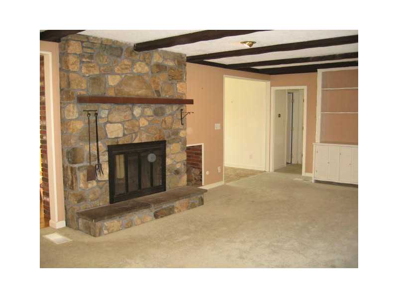 1495 Chopmist Hill Road Scituate, RI 02857 - Photo 6 of 25 Living Room. Huge living room with beautiful stone fireplace!