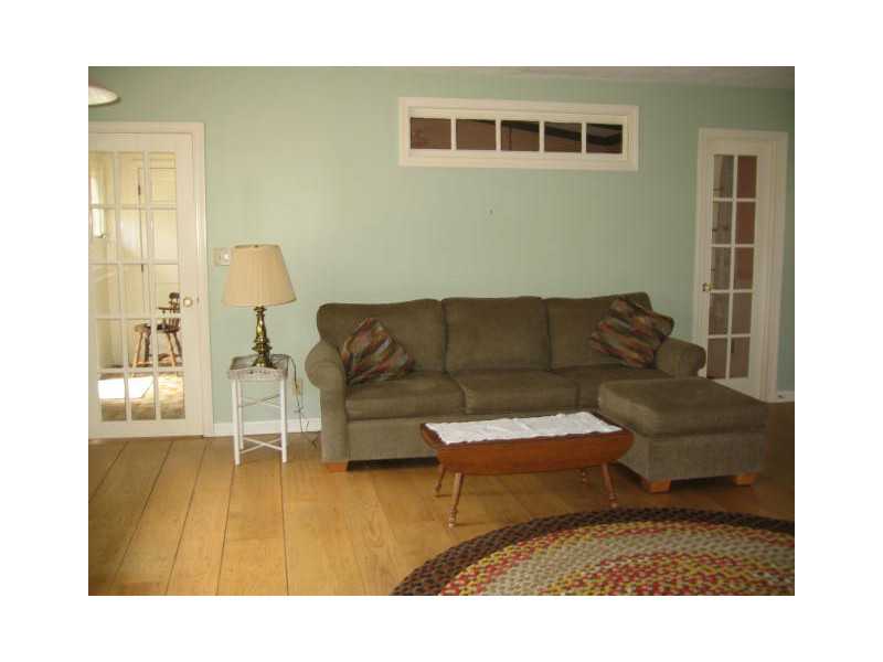 1495 Chopmist Hill Road Scituate, RI 02857 - Photo 10 of 25 Den/Family/Great Room. Family Room with french doors and gas wood stove!
