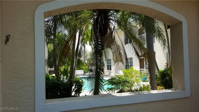 a view of a garden from a porch