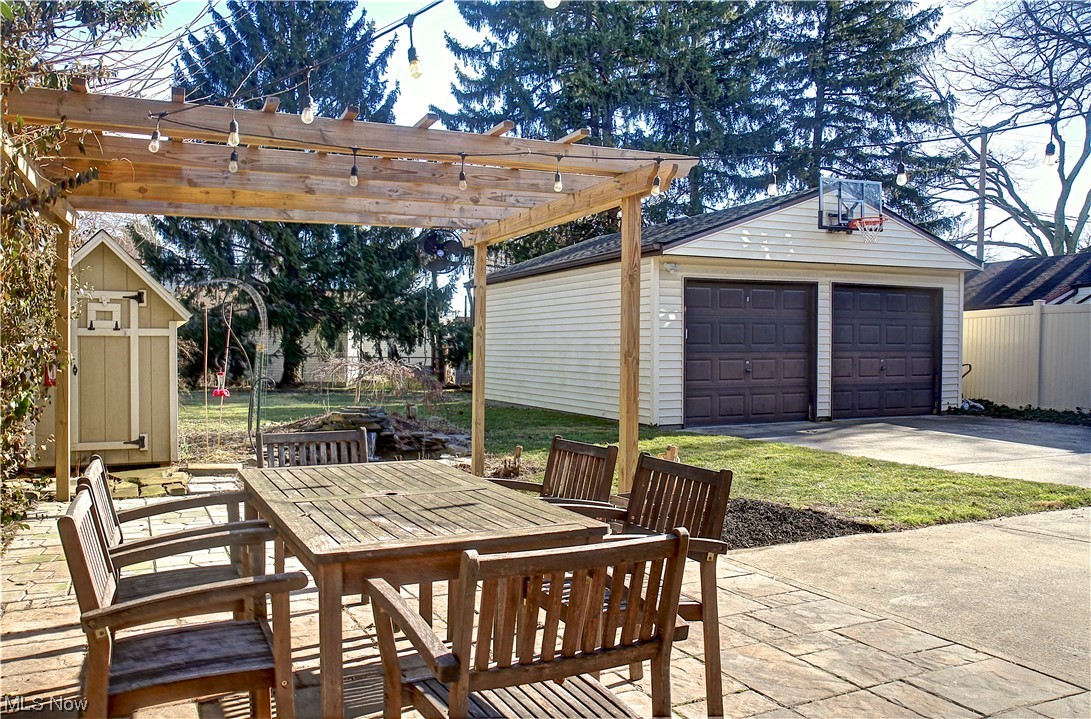 3717 Warren Road Cleveland, OH 44111 - Photo 47 of 50 View of patio with an outdoor structure and a garage