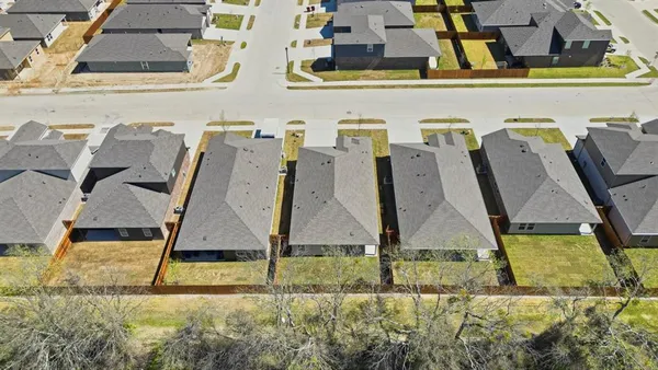 wooden floor with white walls