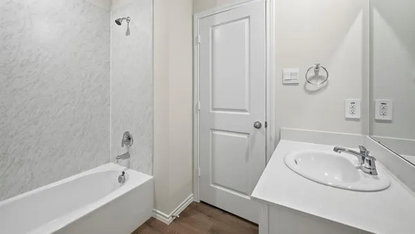 a bathroom with a sink and a tub