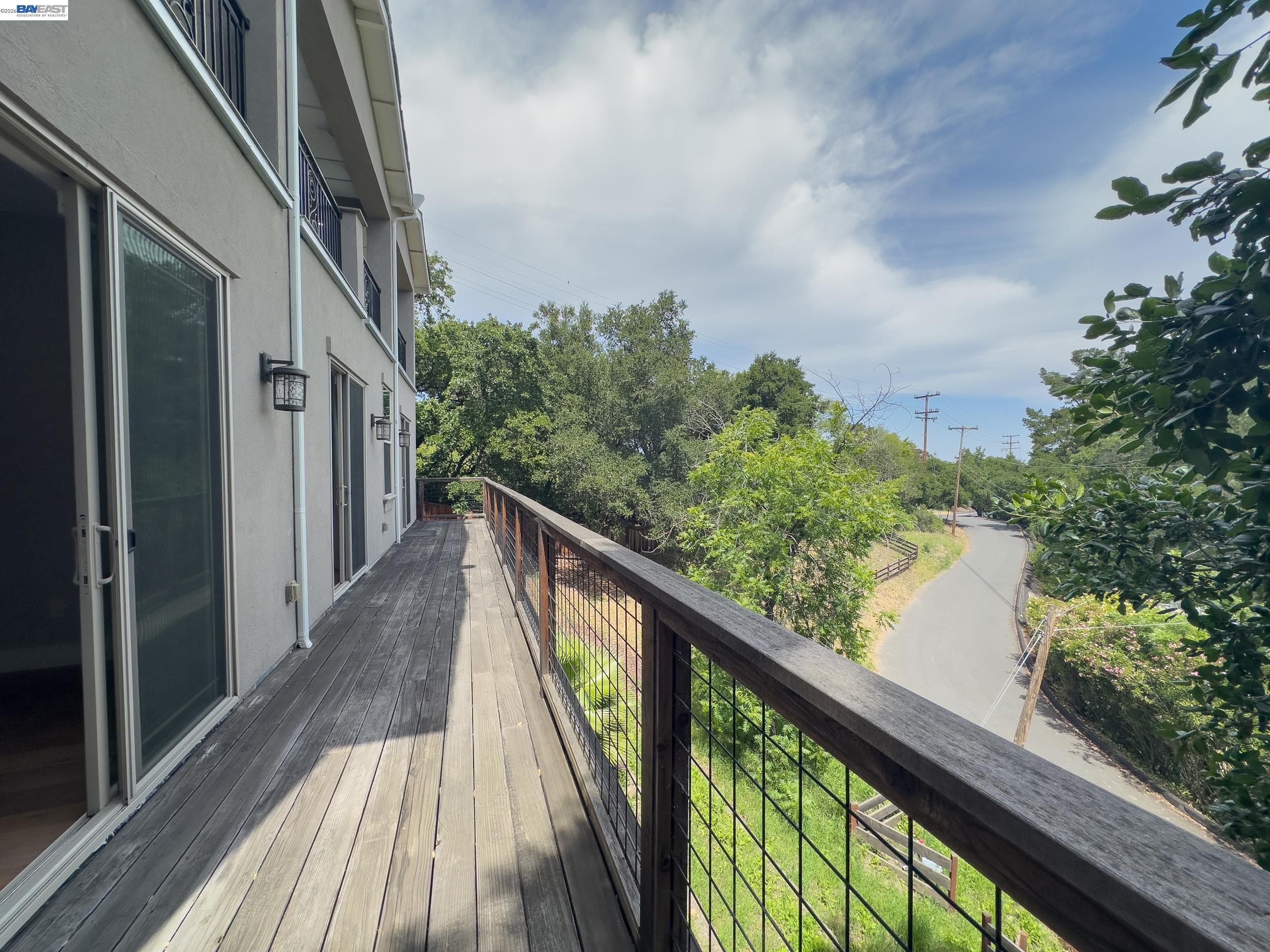 1516 Pleasant Hill Road Lafayette, CA 94549 - Photo 20 of 38 a balcony with wooden floor and fence