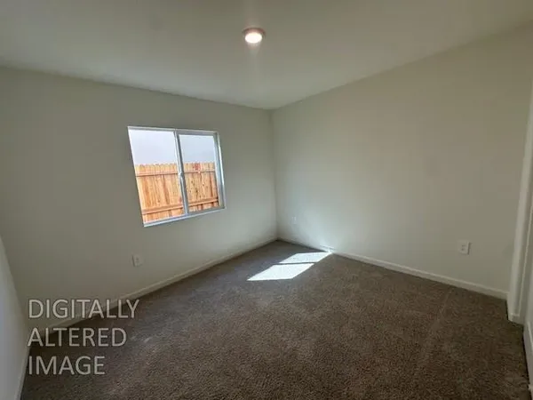 a bathroom with a sink toilet a mirror and shower