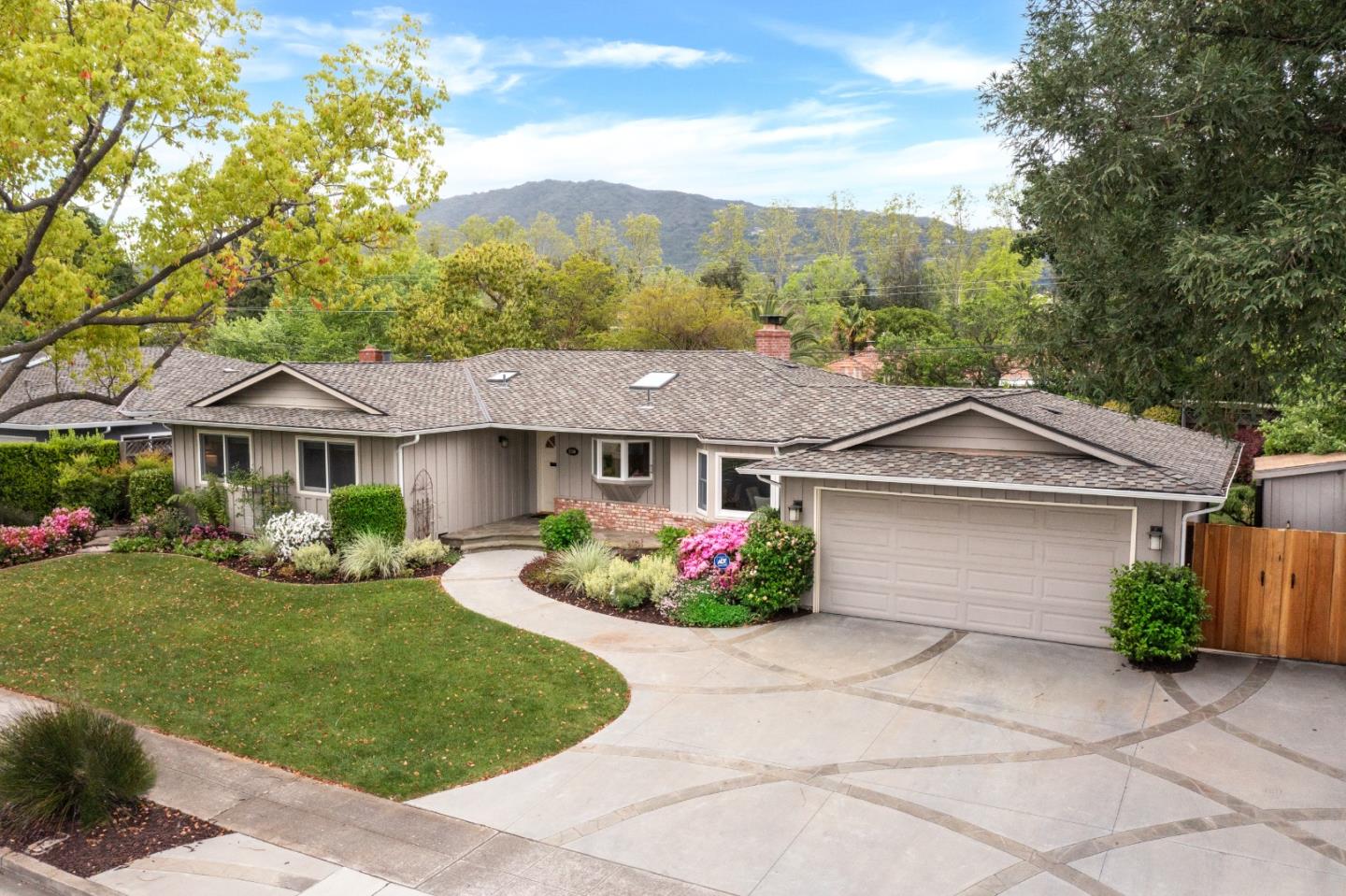 830 Cherrystone Drive Los Gatos, CA 95032 - Photo 18 of 28 a front view of a house with garden
