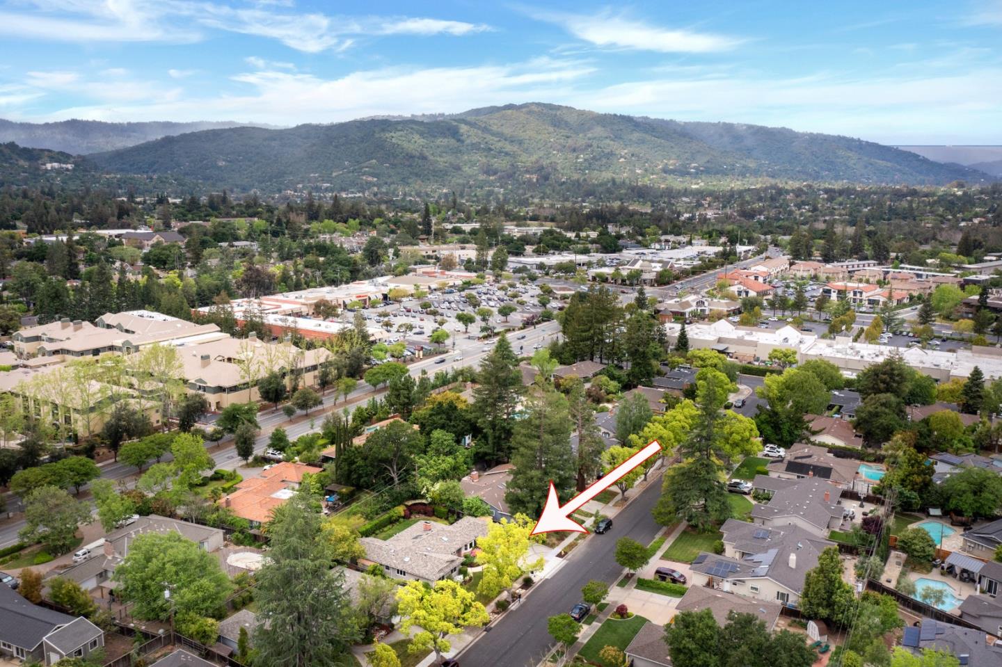 830 Cherrystone Drive Los Gatos, CA 95032 - Photo 21 of 28 a view of a city with mountains in the background