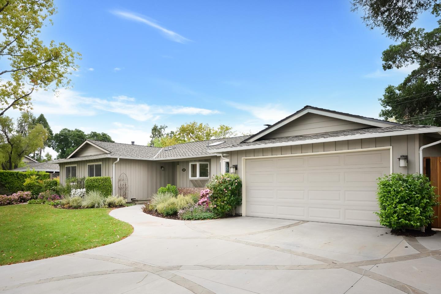 830 Cherrystone Drive Los Gatos, CA 95032 - Photo 4 of 28 a front view of a house with a yard