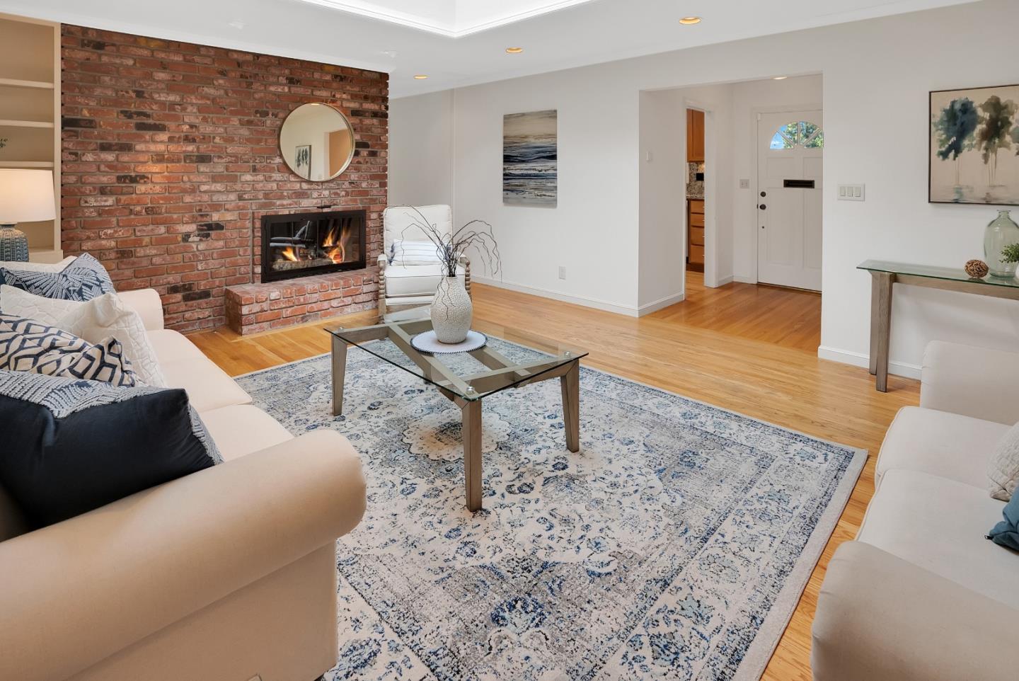 830 Cherrystone Drive Los Gatos, CA 95032 - Photo 6 of 28 a living room with furniture and a fireplace