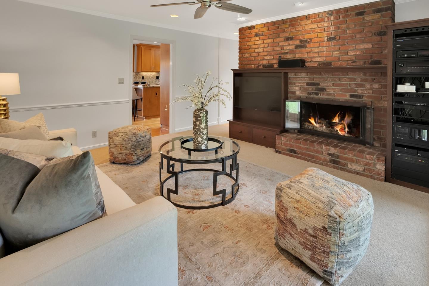 830 Cherrystone Drive Los Gatos, CA 95032 - Photo 8 of 28 a living room with furniture and a fireplace