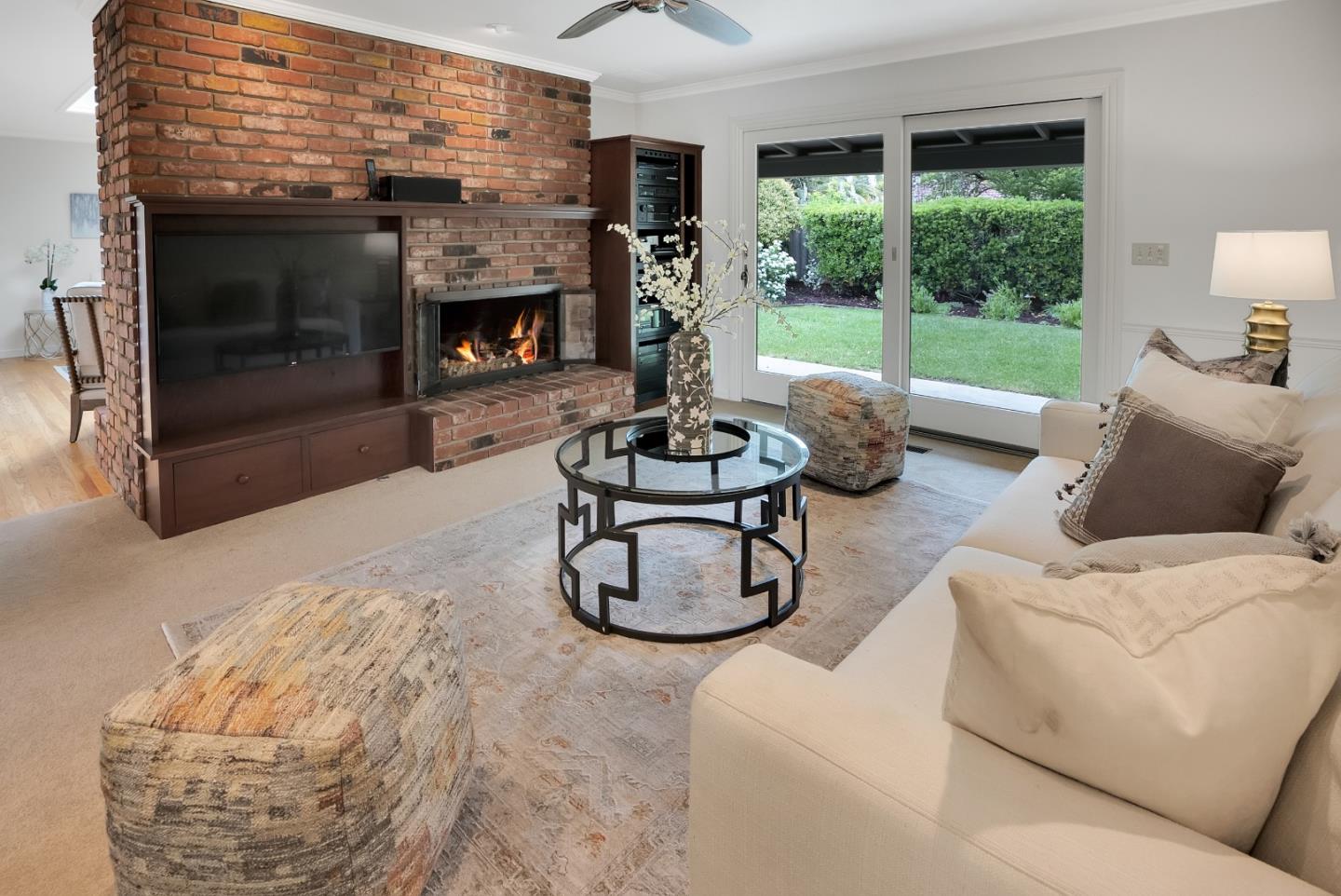 830 Cherrystone Drive Los Gatos, CA 95032 - Photo 9 of 28 a living room with furniture a fireplace and a large window