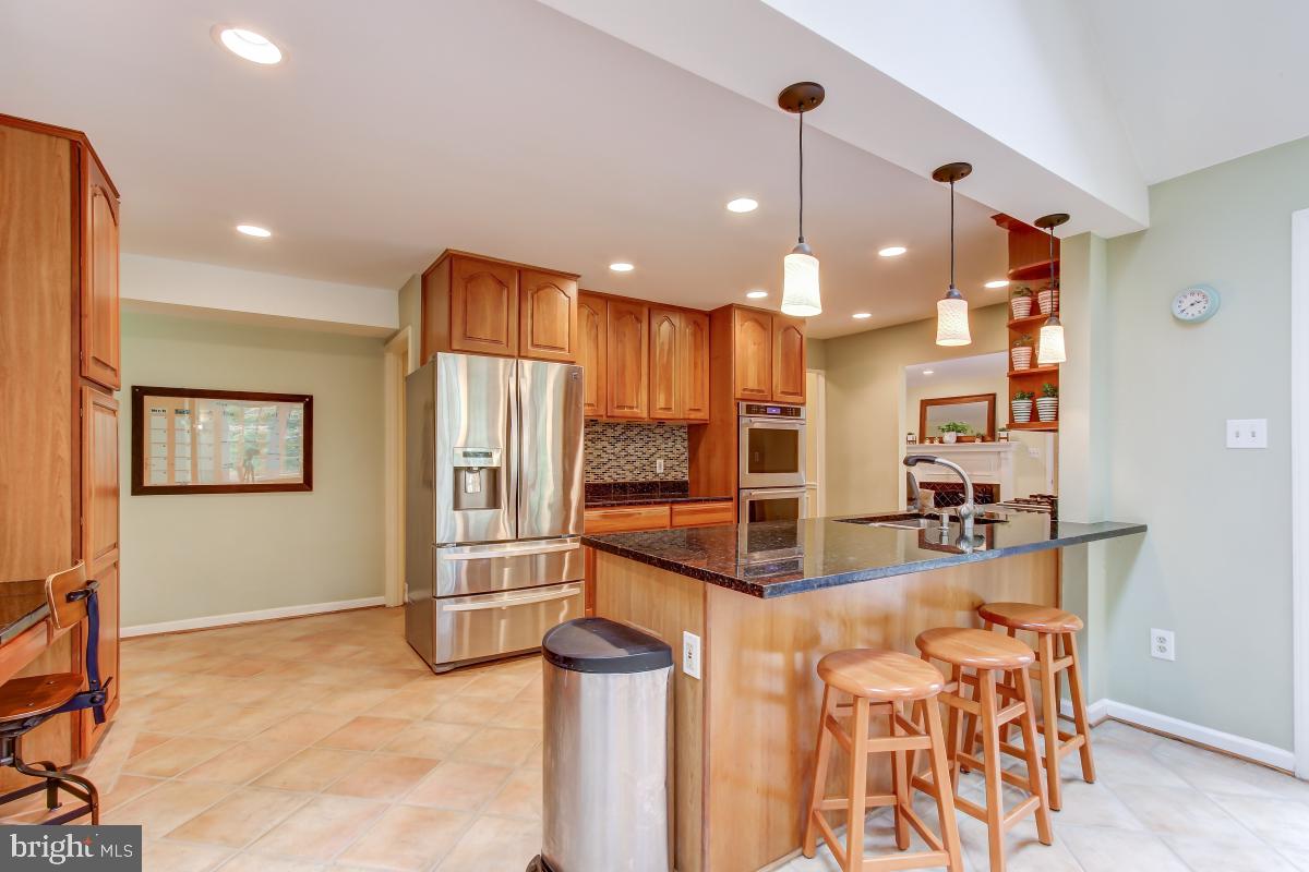 1808 Post Oak Trail Reston, VA 20191 - Photo 14 of 51 Kitchen with Island