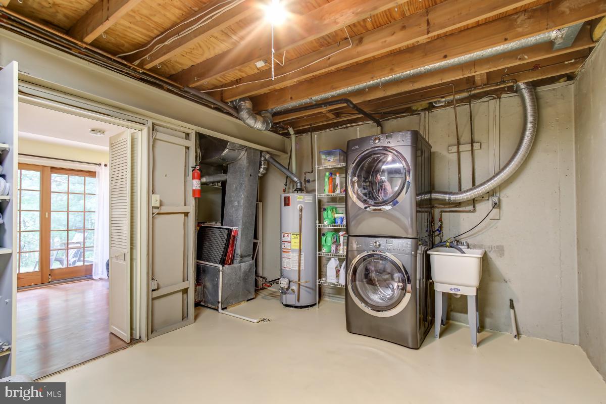 1808 Post Oak Trail Reston, VA 20191 - Photo 43 of 51 Utility Room w/Front Loading Washer/Dryer