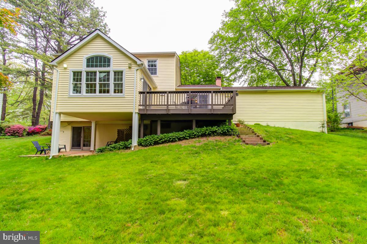 1808 Post Oak Trail Reston, VA 20191 - Photo 47 of 51 Backyard View of Deck and Addition