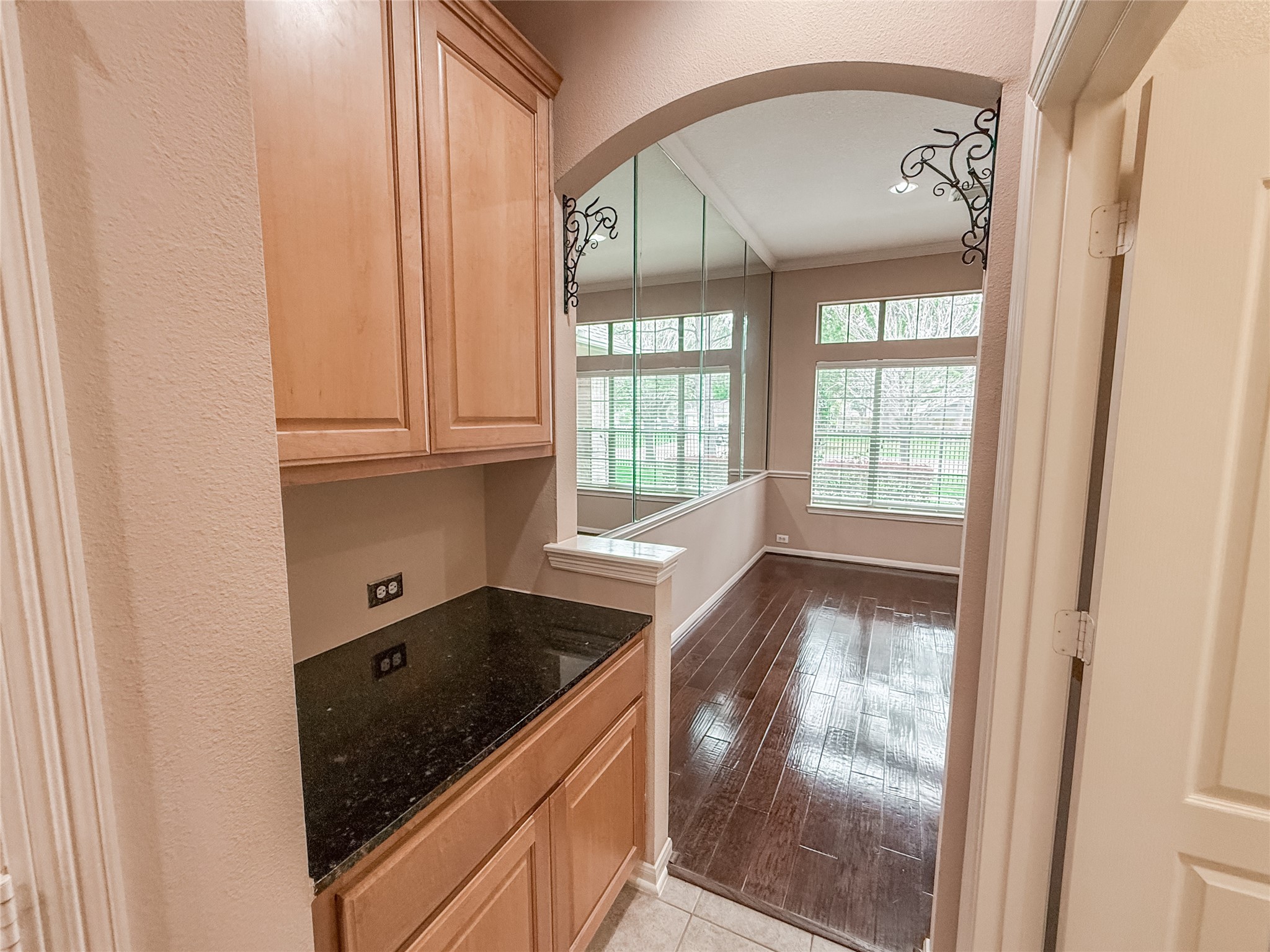 2426 Clippers Square Houston, TX 77058 - Photo 11 of 34 a view of a sink and dishwasher with wooden floor