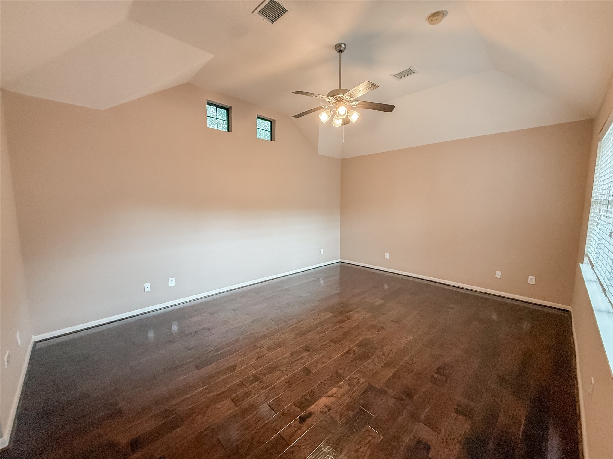2426 Clippers Square Houston, TX 77058 - Photo 16 of 34 wooden floor in an empty room with a window